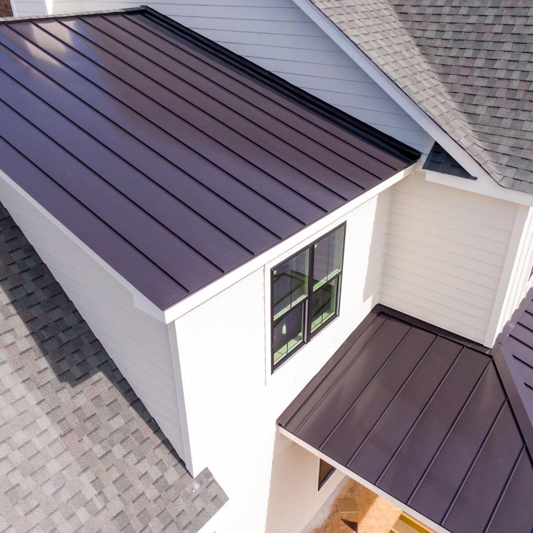 Roofing contractor documenting hail damage for insurance claim